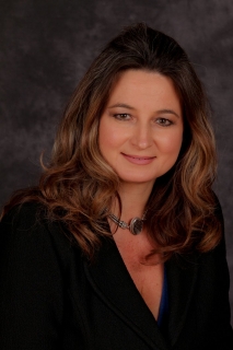 Kelly McMenomy - Vice President